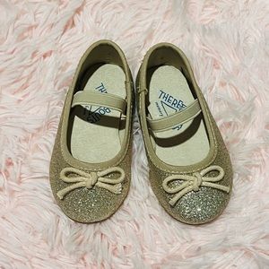 Gold glittery shoes